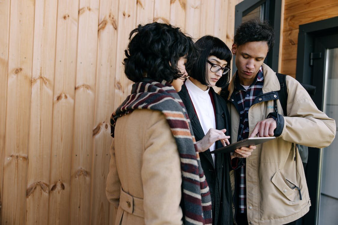 A Couple Talking to the Real Estate Agent