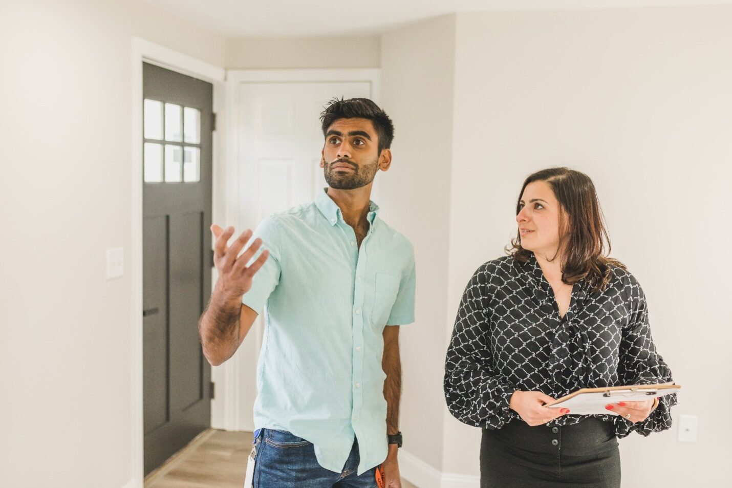 Realtor Showing a Client a House for Sale