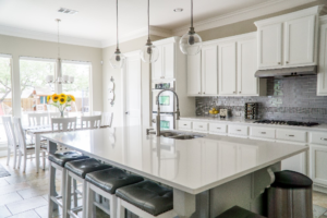 Sunflowers in a kitchen by https://images.pexels.com/photos/1080721/pexels-photo-1080721.jpeg?auto=compress&cs=tinysrgb&w=1260&h=750&dpr=1