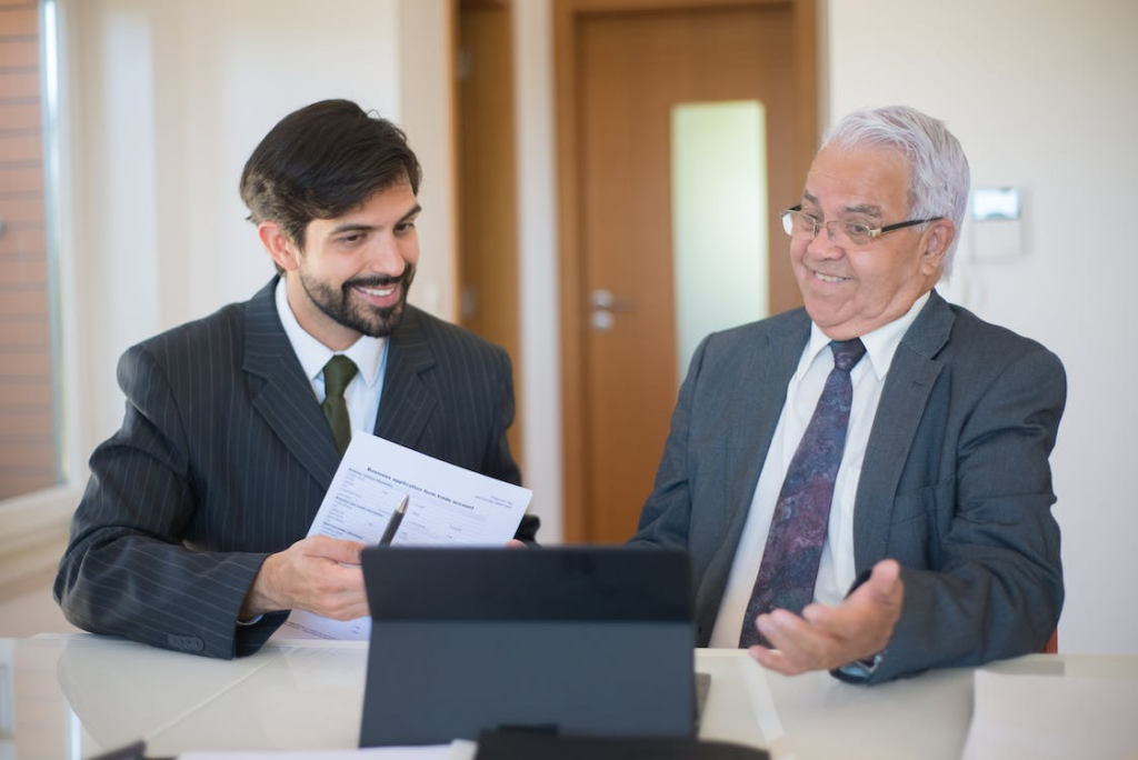 A real estate agent with a client