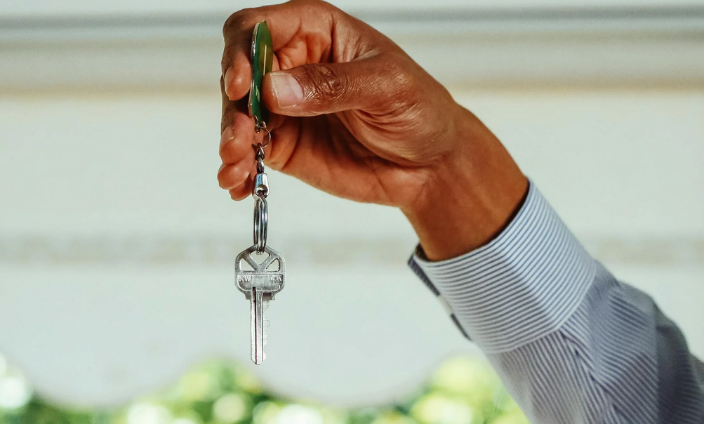 A person holding a key