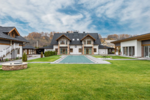 Modern home exterior with manicured lawn showcasing strong curb appeal.